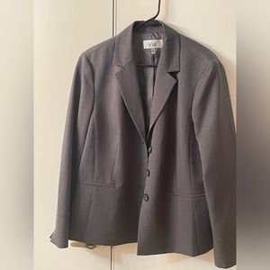 Grey lined suit jacket and pants